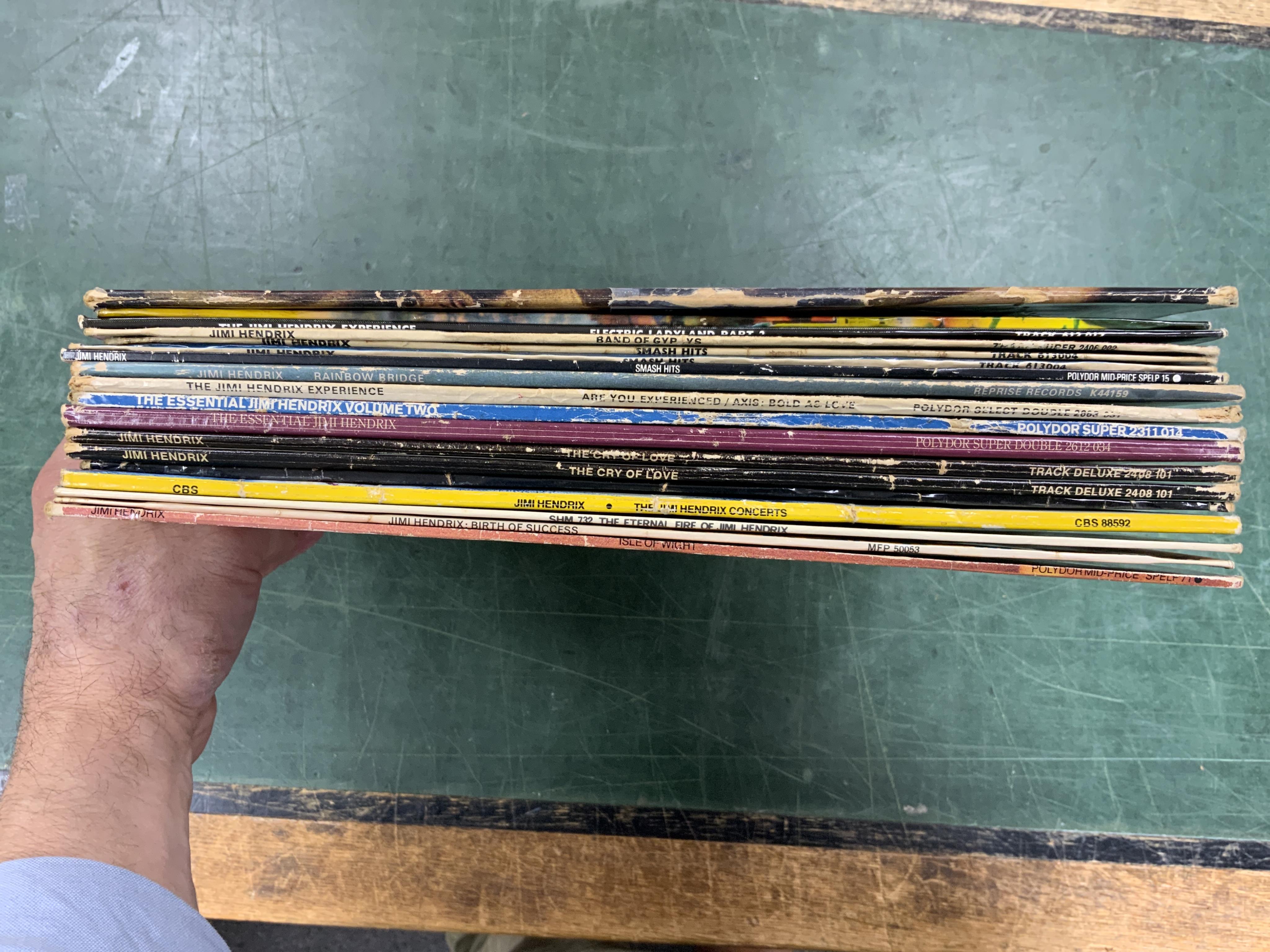 Eighteen Jimi Hendrix LP record albums including; Electric Ladyland, Band of Gypsies, Smash Hits, The Cry of Love, Live Experience, Isle of Wight, etc. plus duplicates. Condition - fair